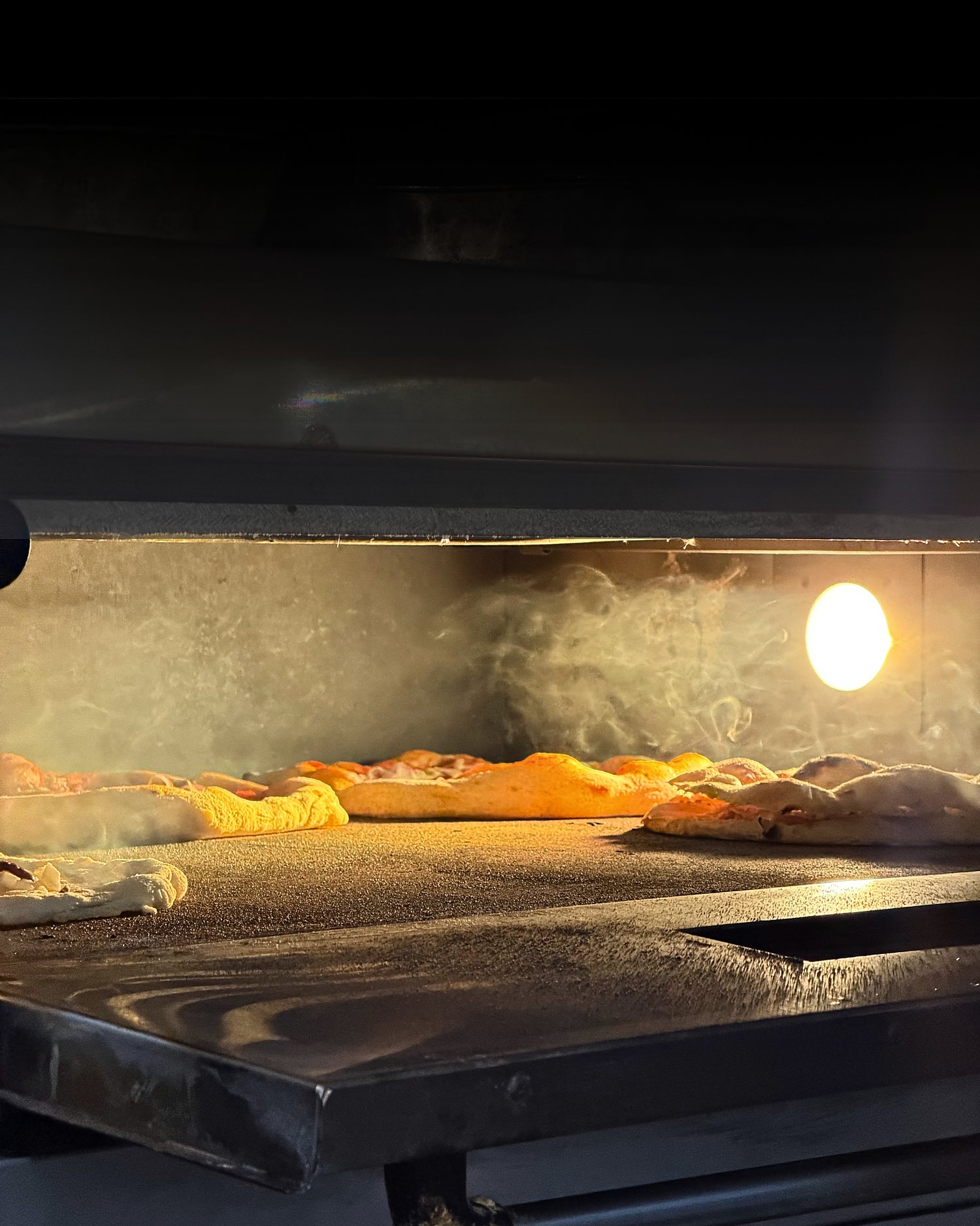 Pizze in cottura nel forno